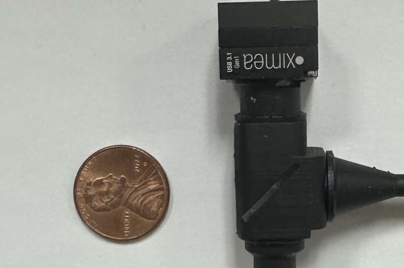 The first miniature microscope capable of recording neuronal activity ...